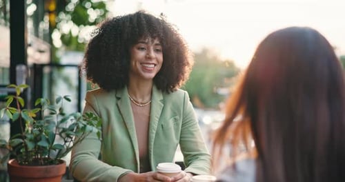 Friends, coffee shop and women laughing in city for funny joke, conversation and hangout to relax