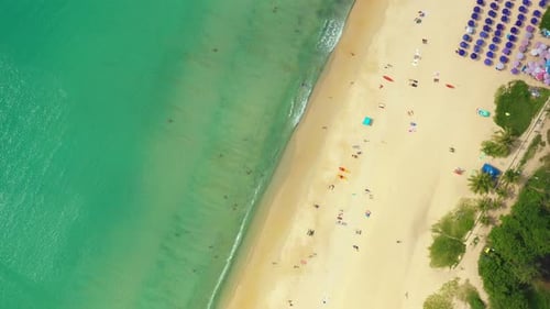 Aerial flying drone view of Kot Noi Beach white sandy beach on sunny tropical paradise island with a