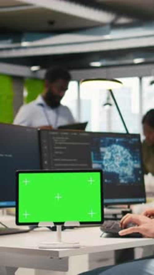 Vertical Video Technician Developing Applications Using Chroma Key Tablet Integrating AI