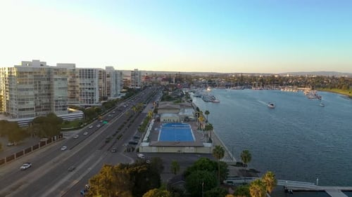 Forward-Slider Aerial shot over Coronado Community Center in San Diego, California During Golden Hou