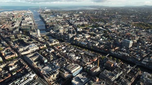 Downtown Dublin, Ireland, High Rise Aerial View of Cityscape, Buildings, Liffey River and Skyline on