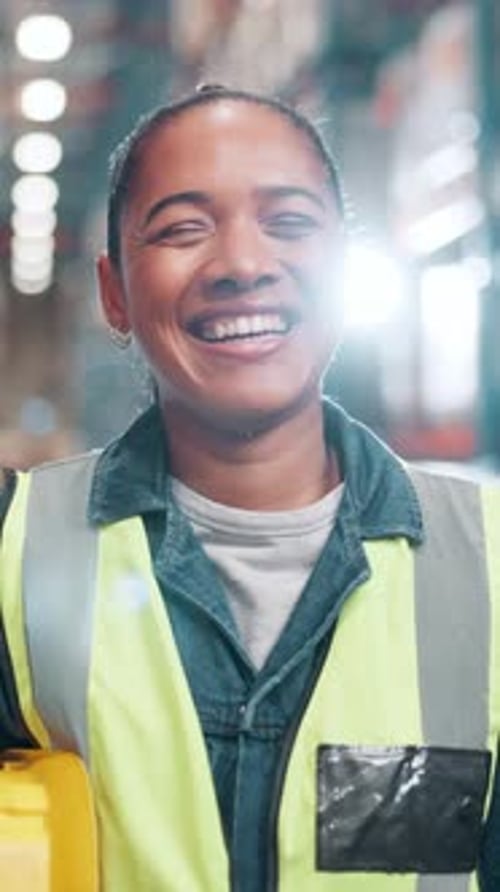 Face, laughing and logistics with woman in warehouse for distribution, shipping or supply chain