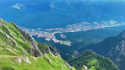 Picturesque residential area located in the green valley among the spectacular mountains.