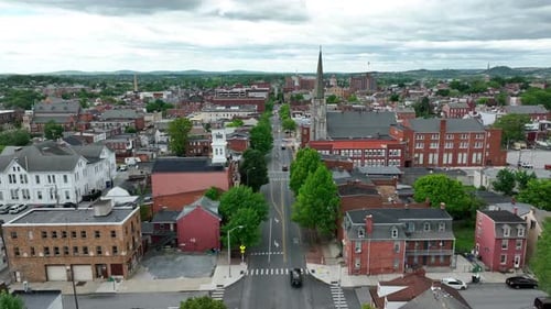 Rising drone shot showing historic town named York in Pennsylvania, USA. Cityscape with old town, ca