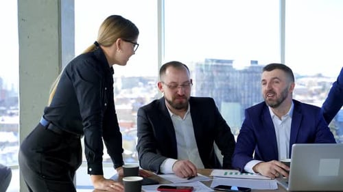 Business Team Meeting at Modern Workspace