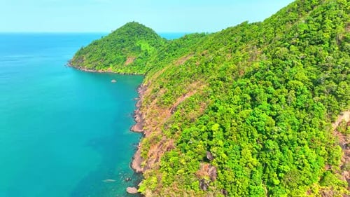 An aerial view reveals the beauty of a tropical island in Thailand. 4K.