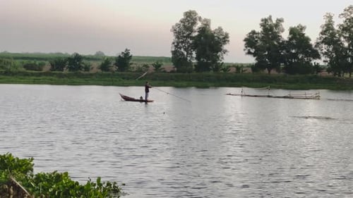 The fishermen cast their nets wide, hoping to catch the abundant fish that swim in the lake's depths