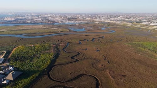 Aerial view of winding river through marsh, United States.