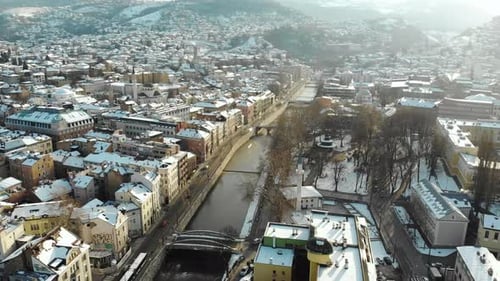 Snowy sunrise in Sarajevo. The Miljacka is the famous river that flows through this Bosnian capital.