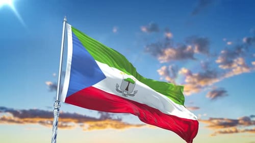 Realistic Equatorial Guinea National Flag Waving in Blue Sky