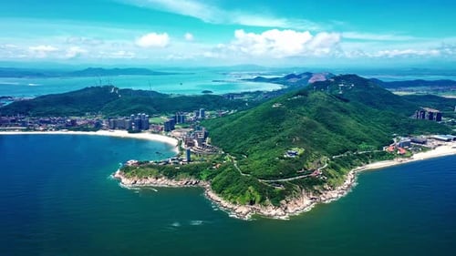 Aerial Top view of a transparent blue sea with beautiful waves at sunny day in summer. air of ocean