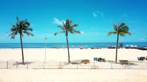 Aerial Top view of a transparent blue sea with beautiful waves at sunny day in summer. air of ocean