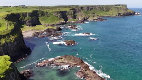 Aerial footage of the coastline in Northern Ireland, United Kingdom