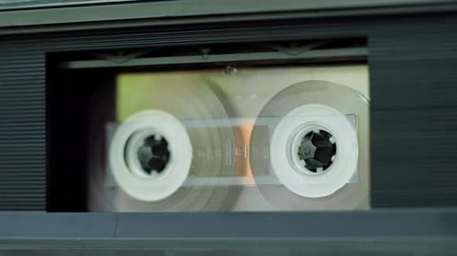 Cassette Tape Spinning in Player