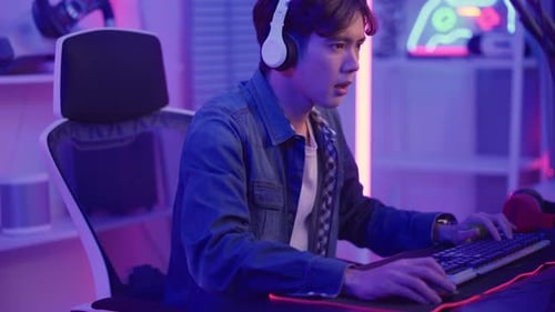 Excited Man Wins Video Game, Celebrating Victory