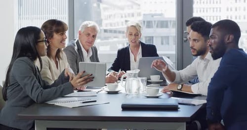 Professionals Collaborating Around a Conference Table