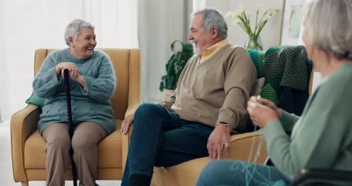 Seniors Socializing and Knitting in Bright Living Room