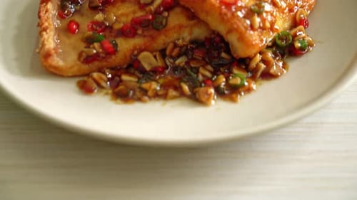 Delicious Fried Tofu Topped with Spicy Chili Sauce