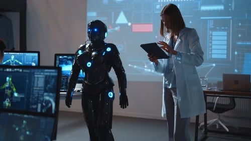 A Woman Dressed in a White Lab Coat is Standing Beside a Robot