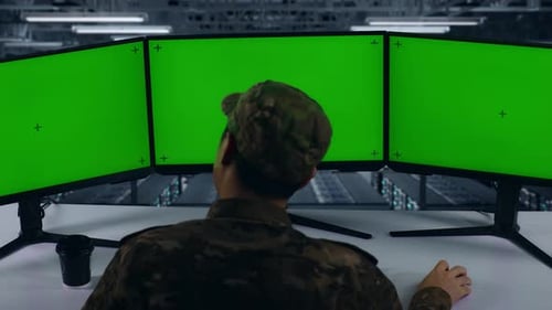Military Having Headache While Working With Mock Up Multiple Computer Monitor In Data Center