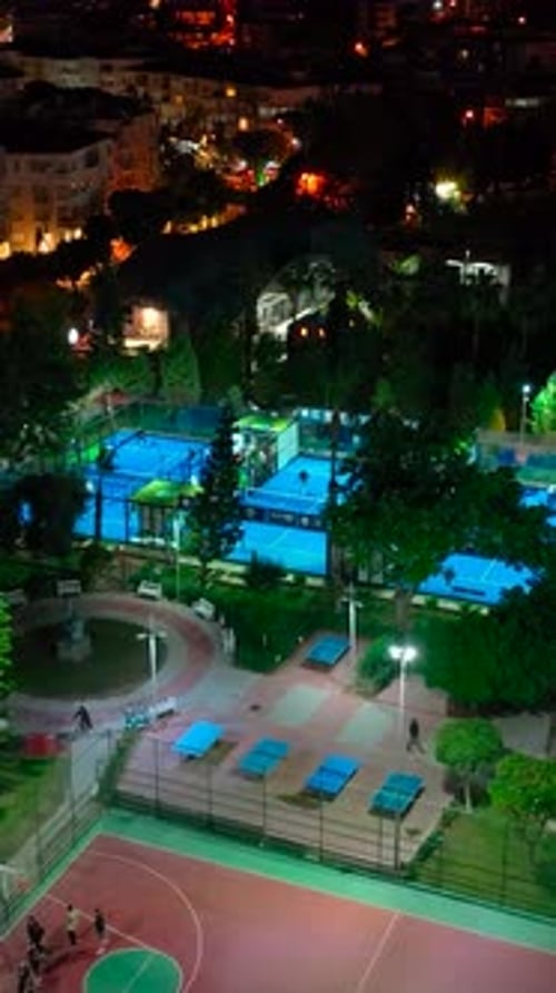 Night Tennis Games in Vibrant Urban Courts