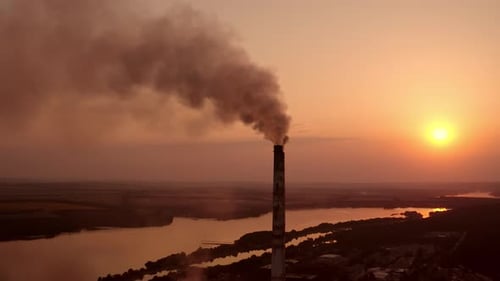 Power pylons on sunset time background. High voltage electric tower at the sunset. Fabric concept.