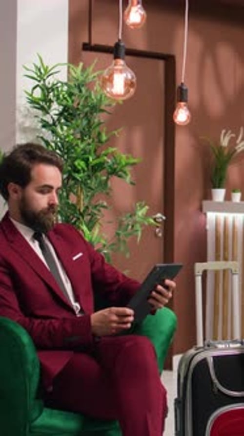 Vertical Video Entrepreneur in Hotel Lounge Area