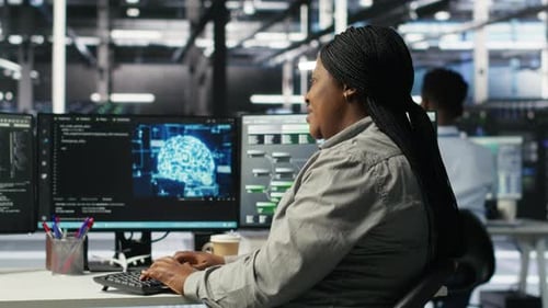 Data Center Employee Deploying AI Solutions Optimizing Equipment