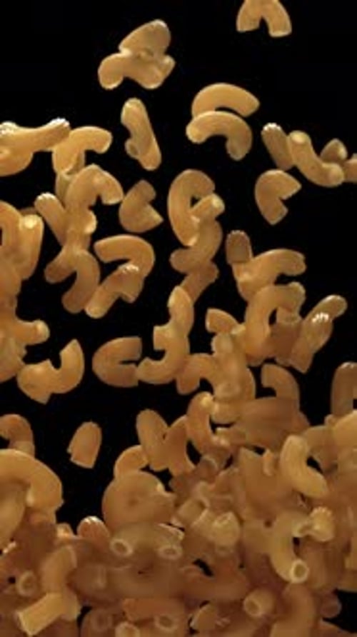 The Dry Pasta Flies Up and Falls Down Filmed on a Highspeed Camera at 1000 Fps