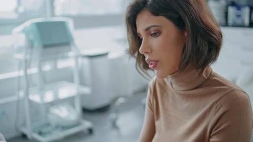 Hospital Patient Looking Tablet at Clinic Consultation Closeup Serious Doctor