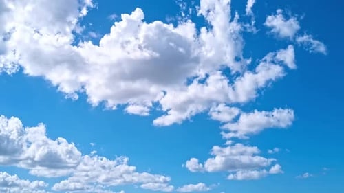 Time-Lapse of White Clouds in Blue Sky