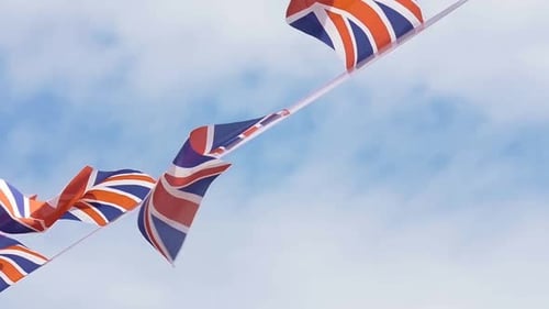Flags of the United Kingdom blowing in the wind
