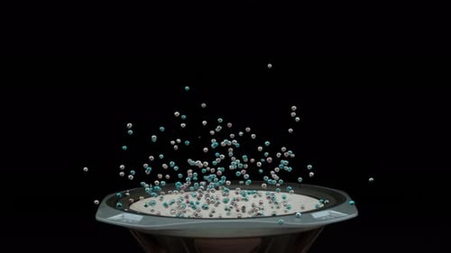 Bouncing spheres on speaker cone with black background