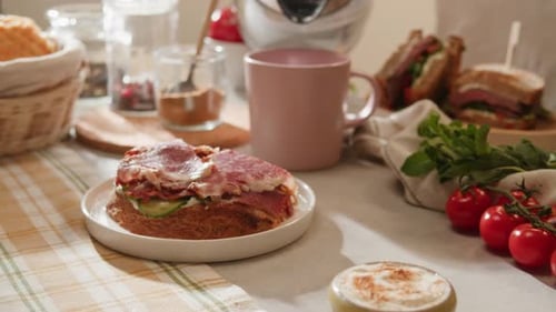 American Pastrami Sandwich with Ham Meet Cuts in Restaurant Cafe Kitchen Fresh Cucumber on Bread