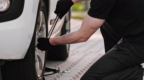 Mechanic Fixes Car