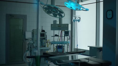 Tracking Shot of Dark Interior Modern Operating Room and Equipment in Hospital No People Medical