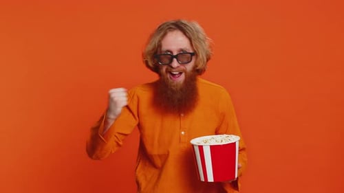 Excited Man in 3D Glasses Eating Popcorn Watching Interesting Tv Serial Sport Game Cinema Film