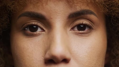 Curly Woman Eyes Extreme Close Up