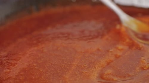 Close Up of Boiling Sugar with Bubbles Turns Into Caramel Caramelization Chef Cooking Dessert in