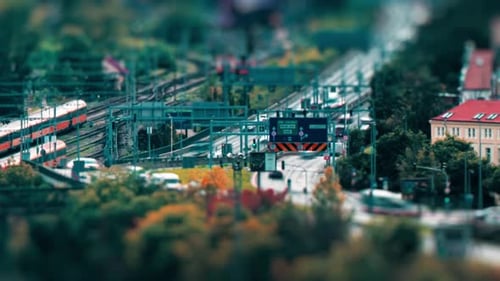Smichov in Prague, Czechia. Busy traffic flowing on the road - cars, busses, and trucks rushing past