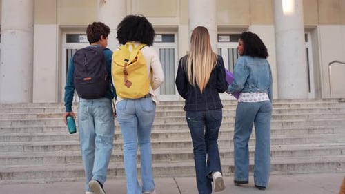 Group of Multiracial University Students Walking to Class on Campus
