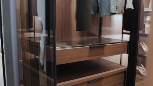 Modern Wardrobe with Wood Shelves and Black Trim