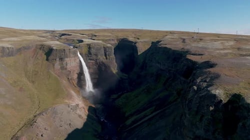 Haifoss Waterfall And Volcanic Canyon In Iceland. - aerial descend shot