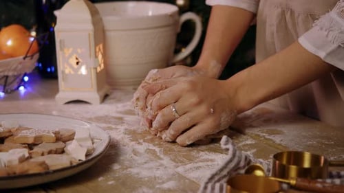 Large Piece of Dough with Cocoa and Chocolate is Kneaded By Baker Using Their Hands in Kitchen