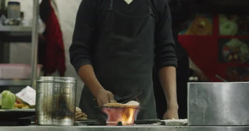Man Cooking Street Food on