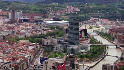 Beautiful Aerial View of Bilbao Cityscape with Iconic Landmarks Like Guggenheim Museum and Iberdrola