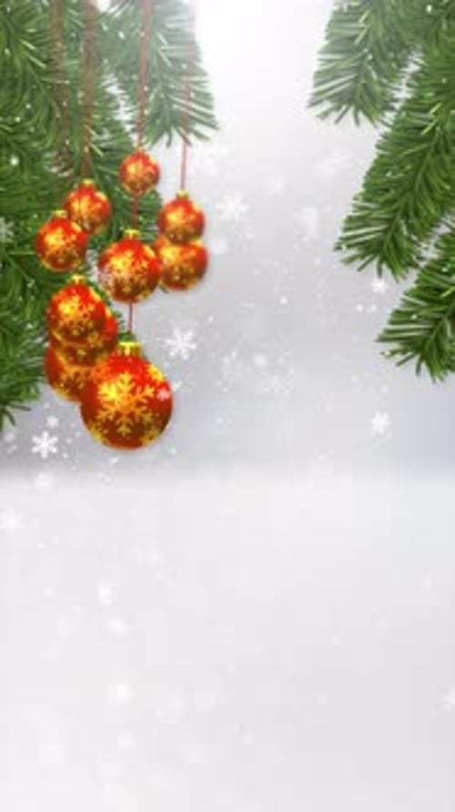 Christmas Ornaments and Pine Branches with Falling Snow Background
