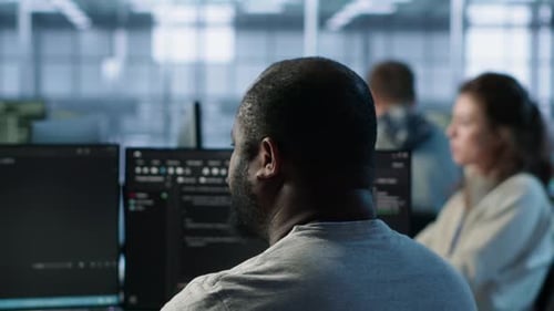 Admin Working in Computer Network Security Data Center Listening Music