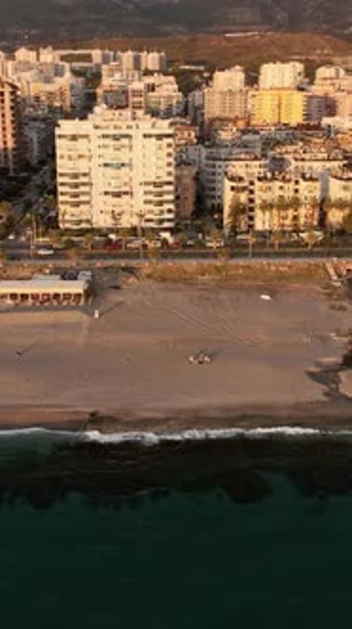 Vertical Video Aerial Panorama Coastal City on the Mediterranean Sea