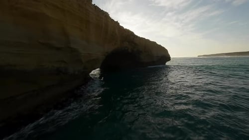 Rocks and a Sandy Cliff By the Ocean in Australia